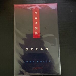 Prada Fragrance with Red and Blue Accents